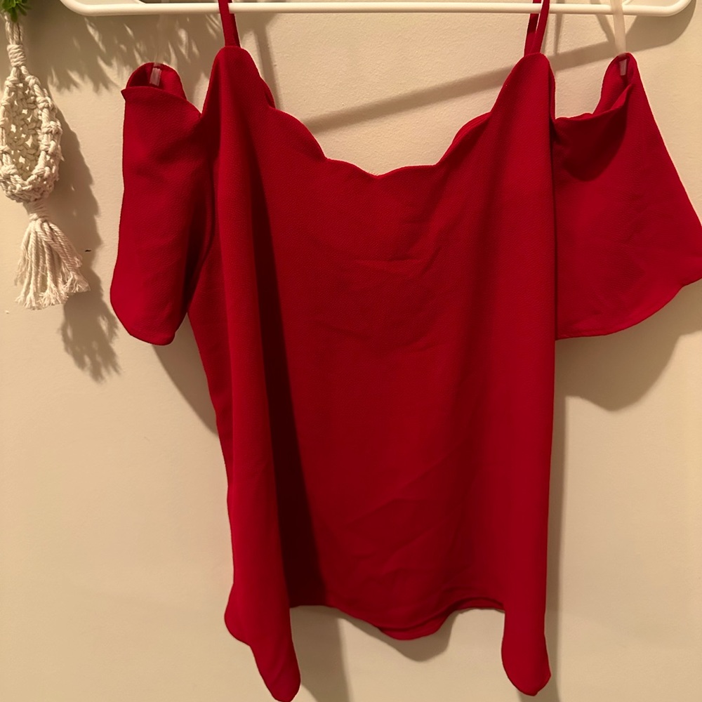 Red scalloped off the shoulder blouse